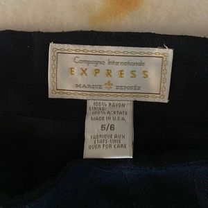 Short black pleading a little slit in the back zip up beautiful skirt